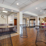 lobby view with tables and front desk