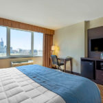 one king bed room with view of Connecticut State Capitol